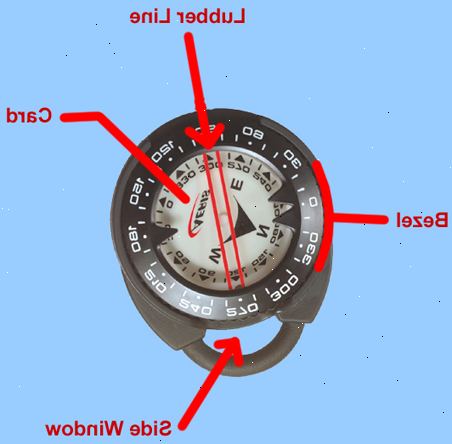 Hvordan bruke en undersjøisk kompass. Fortsatt på båten, satte styrestrek (fast rød linje) i retning av din destinasjon eller parallelt med kysten der du skriver inn vann (i tilfelle det er behov bare som en generell orientering).