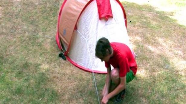 Hvordan å kaste en pop up telt. Skaff en pop-up telt.